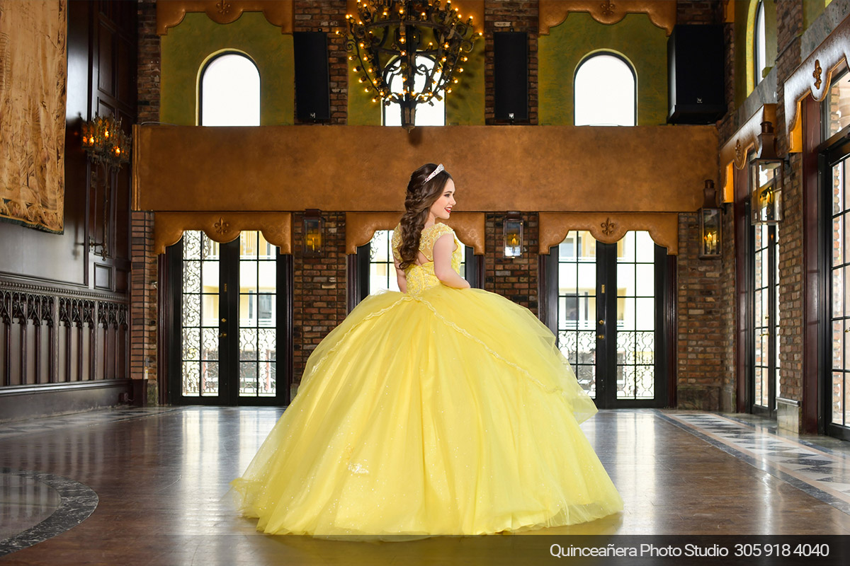 Quinceañera in The Cruz Building with beauty and the beast dress, Photo by Quinceanera photo studio (304) 918-4040