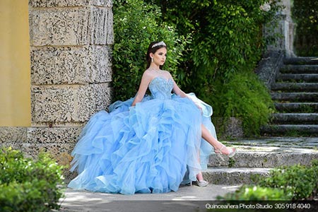 Quinceañera in Vizcaya with blue dress. Photo by Quinceanera Photo Studio 305.918.4040