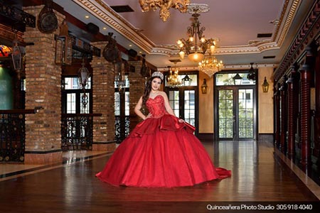 Quinceanera in The Cruz Building with burgundy dress. Photo by Quinceanera Photo Studio 305.918.4040